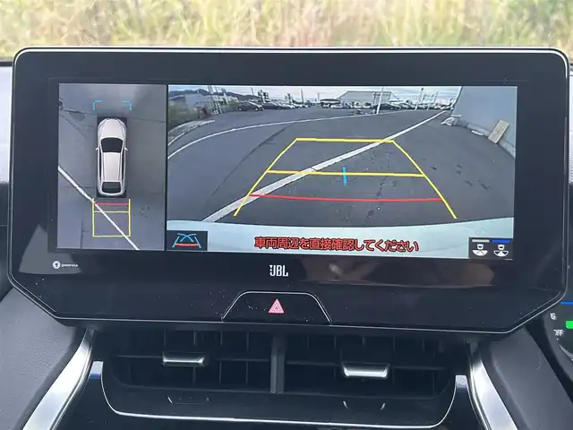 トヨタ ハリアー ハイブリッド Z 岡山県 2020(令2)年 8.4万km ホワイトパールクリスタルシャイン 登録時走行距離83180km/JBLプレミアムサウンド/純正12.3インチナビ/フルセグTV(AM.FM.TV.BT)/全方位カメラ/ETC2.0/ブラインドスポットモニター/デジタルインナーミラー/ヘッドアップディスプレイ/クリアランスソナー/衝突軽減ブレーキ/横滑り防止装置/クルーズコントロール(追従走行あり)/車線逸脱警報（レーンキープアシスト）/オートライト/オートマチックハイビーム/アイドリングストップ/電動リアゲート/19インチ純正AW/純正フロアマット/ハーフレザーシート/D席パワーシート/スマートキー/プッシュスタート/ドアバイザー