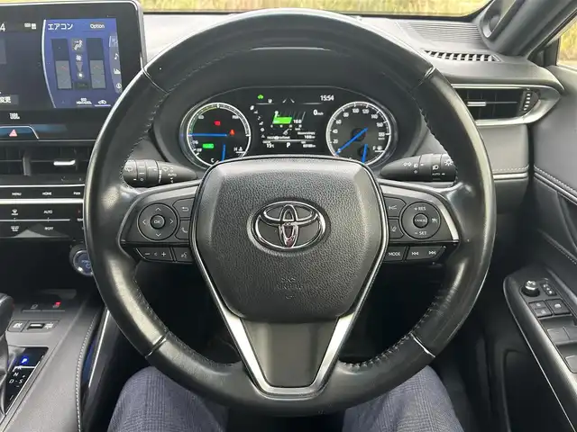 トヨタ ハリアー ハイブリッド Z 岡山県 2020(令2)年 8.4万km ホワイトパールクリスタルシャイン 登録時走行距離83180km/JBLプレミアムサウンド/純正12.3インチナビ/フルセグTV(AM.FM.TV.BT)/全方位カメラ/ETC2.0/ブラインドスポットモニター/デジタルインナーミラー/ヘッドアップディスプレイ/クリアランスソナー/衝突軽減ブレーキ/横滑り防止装置/クルーズコントロール(追従走行あり)/車線逸脱警報（レーンキープアシスト）/オートライト/オートマチックハイビーム/アイドリングストップ/電動リアゲート/19インチ純正AW/純正フロアマット/ハーフレザーシート/D席パワーシート/スマートキー/プッシュスタート/ドアバイザー