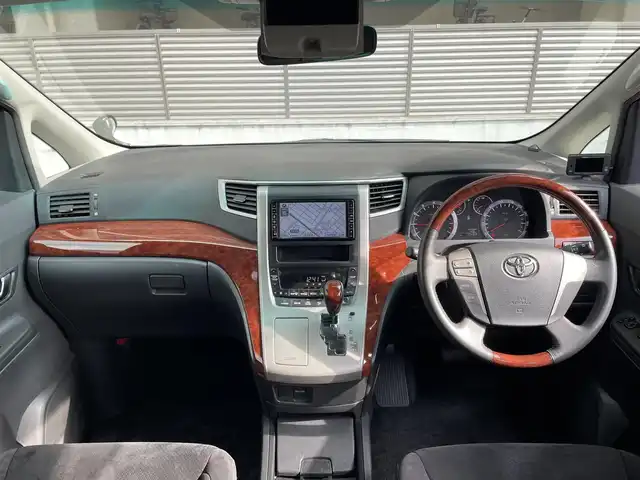 トヨタ ヴェルファイア 2．4Z プラチナセレクション 大阪府 2009(平21)年 7.6万km ブラック 純正ナビ/　FM/AM/フルセグTV/Bluetooth/AUX/CD/DVD/フリップダウンモニター/パワーバックドア/ステアリングスイッチ/革巻きステアリング/バックカメラ/フロントコーナーセンサー/クリアランスソナー/HIDヘッドライト/フォグランプ/純正18インチアルミホイール/プッシュスタート/オートライト/スペアキー/記録簿：H24.26.28.30.R2.4.6年分あり