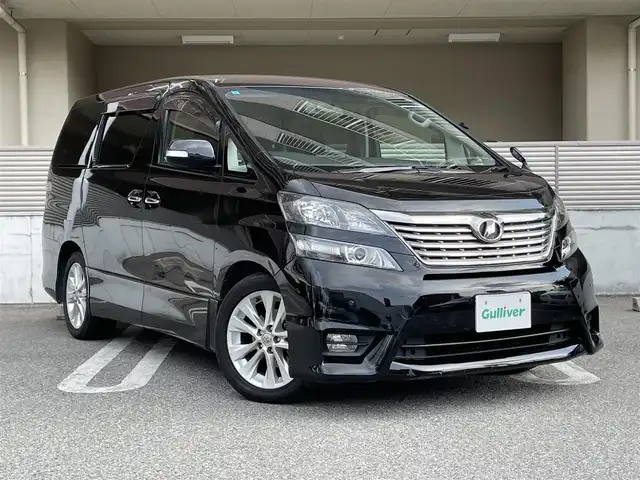 トヨタ ヴェルファイア 2．4Z プラチナセレクション 大阪府 2009(平21)年 7.6万km ブラック 純正ナビ/　FM/AM/フルセグTV/Bluetooth/AUX/CD/DVD/フリップダウンモニター/パワーバックドア/ステアリングスイッチ/革巻きステアリング/バックカメラ/フロントコーナーセンサー/クリアランスソナー/HIDヘッドライト/フォグランプ/純正18インチアルミホイール/プッシュスタート/オートライト/スペアキー/記録簿：H24.26.28.30.R2.4.6年分あり