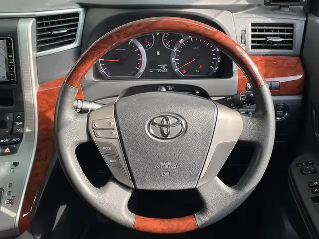 トヨタ ヴェルファイア 2．4Z プラチナセレクション 大阪府 2009(平21)年 7.6万km ブラック 純正ナビ/　FM/AM/フルセグTV/Bluetooth/AUX/CD/DVD/フリップダウンモニター/パワーバックドア/ステアリングスイッチ/革巻きステアリング/バックカメラ/フロントコーナーセンサー/クリアランスソナー/HIDヘッドライト/フォグランプ/純正18インチアルミホイール/プッシュスタート/オートライト/スペアキー/記録簿：H24.26.28.30.R2.4.6年分あり