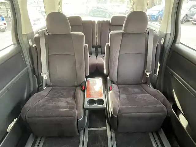 トヨタ ヴェルファイア 2．4Z プラチナセレクション 大阪府 2009(平21)年 7.6万km ブラック 純正ナビ/　FM/AM/フルセグTV/Bluetooth/AUX/CD/DVD/フリップダウンモニター/パワーバックドア/ステアリングスイッチ/革巻きステアリング/バックカメラ/フロントコーナーセンサー/クリアランスソナー/HIDヘッドライト/フォグランプ/純正18インチアルミホイール/プッシュスタート/オートライト/スペアキー/記録簿：H24.26.28.30.R2.4.6年分あり