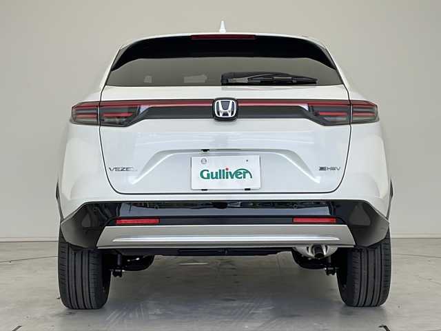 ホンダ ヴェゼル ハイブリッド e:HEV Z 愛知県 2025(令7)年 0.1万km未満 プラチナホワイトパール 登録済未使用車/衝突軽減システム/純正ディスプレイオーディオ（ナビあり）/レーダークルーズコントロール/シートヒーター/フルセグ/Bluetooth/バックカメラ/電動リアゲート/コーナーセンサー/純正アルミホイール/ETC2.0/ブラインドスポットモニター/LEDヘッドライト/パドルシフト/ダウンヒルアシストコントロール/ステアリングヒーター/オートマチックハイビーム/置くだけ充電器/ステアリングスイッチ/スマートキー/プッシュスタート