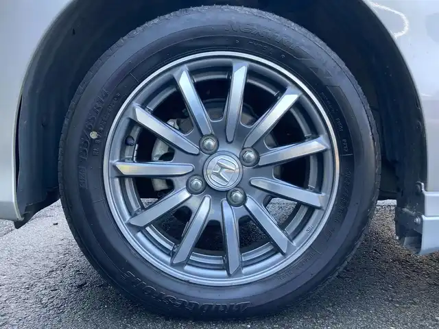 ホンダ Ｎ ＷＧＮ カスタム G Aパッケージ 静岡県 2014(平26)年 5.5万km カトラリーシルバーM あんしんパッケージ/純正メモリーナビ(VXM-145C)/　AM FM CD/ハーフレザーシート/HIDオートヘッドライト/スマートキー2本/純正14インチアルミホイール/AUTOエアコン/アイドリングストップ/フロントフォグライト/バックカメラ