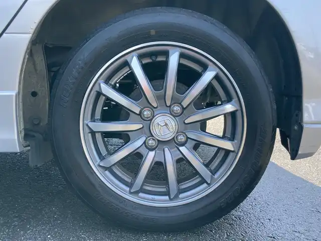 ホンダ Ｎ ＷＧＮ カスタム G Aパッケージ 静岡県 2014(平26)年 5.5万km カトラリーシルバーM あんしんパッケージ/純正メモリーナビ(VXM-145C)/　AM FM CD/ハーフレザーシート/HIDオートヘッドライト/スマートキー2本/純正14インチアルミホイール/AUTOエアコン/アイドリングストップ/フロントフォグライト/バックカメラ