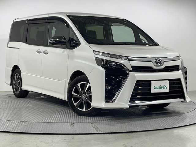 トヨタ ヴォクシー ZS 煌Ⅲ 広島県 2021(令3)年 2.9万km ホワイトパールクリスタルシャイン 純正10型ナビ/純正フリップダウンモニター/両側パワースライドドア/バックカメラ/クリアランスソナー/セーフティセンス/・プリクラッシュセーフティ/・レーンディパーチャーアラート/・オートマチックハイビーム/クルーズコントロール/LEDヘッドランプ/純正16インチAW/ETC2.0/ドライブレコーダー