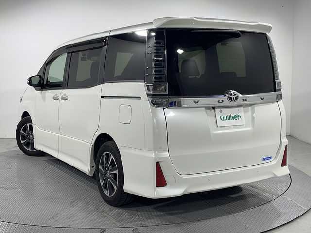 トヨタ ヴォクシー ZS 煌Ⅲ 広島県 2021(令3)年 2.9万km ホワイトパールクリスタルシャイン 純正10型ナビ/純正フリップダウンモニター/両側パワースライドドア/バックカメラ/クリアランスソナー/セーフティセンス/・プリクラッシュセーフティ/・レーンディパーチャーアラート/・オートマチックハイビーム/クルーズコントロール/LEDヘッドランプ/純正16インチAW/ETC2.0/ドライブレコーダー