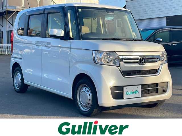 ホンダ Ｎ ＢＯＸ G 道東・釧路十勝 2021(令3)年 2.6万km プラチナホワイトパール 4WD/ホンダセンシング/ナビ　/　(AM/FM/CD/DVD/BT)/ETC/両側パワースライドドア/シートヒーター/社外フロアマット/クルーズコントロール/コーナーセンサー/オートライト/ライトレベライザー/盗難防止装置/ABS/横滑り防止装置/保証書/取扱説明書/記録簿