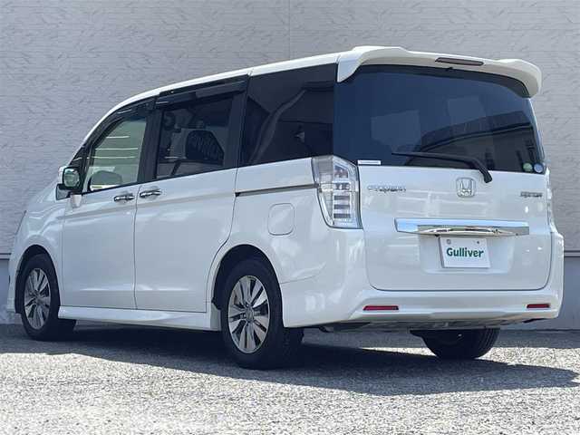 ホンダ ステップワゴン スパーダ Z 大阪府 2015(平27)年 6.2万km ホワイトオーキッドパール ワンオーナー/純正９インチインターナビ(VXM-155VFNi)/BT/CD/DVD/USB/SD/TV/バックカメラ/ドライブレコーダー/両側パワースライドドア/クルーズコントロール/パドルシフト/オートライト/アクティブコーナリングライト/フロントフォグ/純正フロアマット/純正16インチAW/電格ミラー/ドアバイザー/スペアキー/ETC