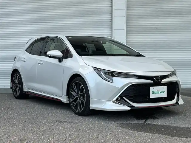 トヨタ カローラ スポーツ G Z 高知県 2022(令4)年 0.8万km プラチナホワイトパールマイカ 純正ナビ/　Bluetooth/Miracast/TRDエアロ/ビルトインETC/LEDヘッドライト/ドライブレコーダー/バックカメラ/トヨタセーフティーセンス/シートヒーター/オートライト/GPSレーダー探知機/ステアリングヒーター/純正18インチアルミホイール/純正フロアマット/本革巻きステアリング/クルーズコントロール/盗難防止装置