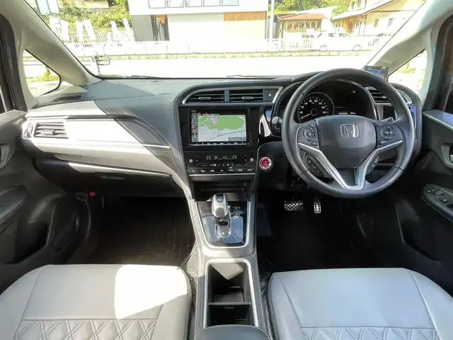 ホンダ シャトル ハイブリッド X ホンダセンシング 岐阜県 2021(令3)年 7.7万km ミッドナイトブルービームM 4WD/純正ナビ/【Bluetooth．CD.DVD.AM/FM．TV】/ホンダセンシング/クルーズコントロール/シートヒーター/スマートキー/ETC/ドライブレコーダー/バックカメラ/純正フロアマット/ウィンカーミラー/オートライト/フォグライト/ドアバイザー/保証書/取扱説明書/スペアキー