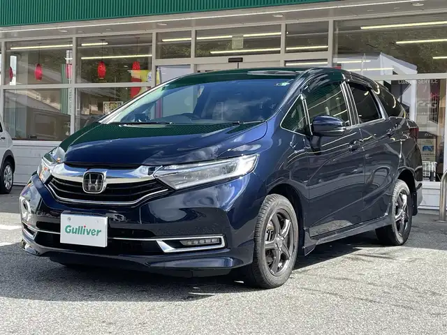 ホンダ シャトル ハイブリッド X ホンダセンシング 岐阜県 2021(令3)年 7.7万km ミッドナイトブルービームM 4WD/純正ナビ/【Bluetooth．CD.DVD.AM/FM．TV】/ホンダセンシング/クルーズコントロール/シートヒーター/スマートキー/ETC/ドライブレコーダー/バックカメラ/純正フロアマット/ウィンカーミラー/オートライト/フォグライト/ドアバイザー/保証書/取扱説明書/スペアキー