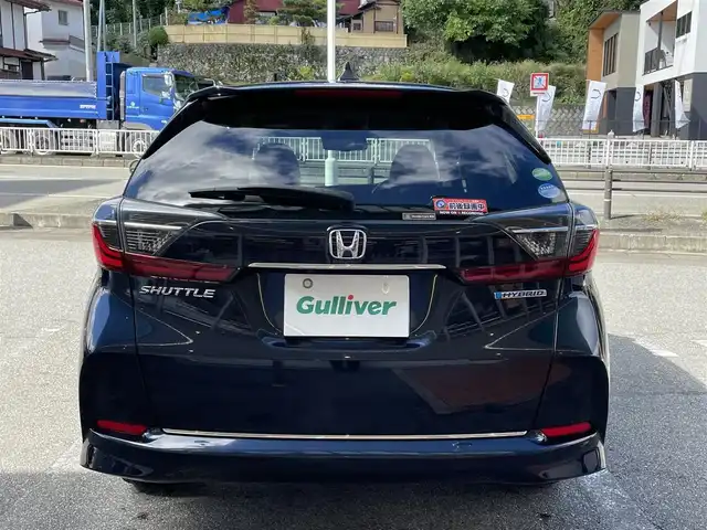 ホンダ シャトル ハイブリッド X ホンダセンシング 岐阜県 2021(令3)年 7.7万km ミッドナイトブルービームM 4WD/純正ナビ/【Bluetooth．CD.DVD.AM/FM．TV】/ホンダセンシング/クルーズコントロール/シートヒーター/スマートキー/ETC/ドライブレコーダー/バックカメラ/純正フロアマット/ウィンカーミラー/オートライト/フォグライト/ドアバイザー/保証書/取扱説明書/スペアキー