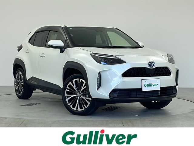 トヨタ ヤリスクロス ハイブリッド Z 愛知県 2021(令3)年 3.7万km ホワイトパールクリスタルシャイン ・ワンオーナー/・純正ナビ/Bluetooth/Apple Carplay/フルセグTV/AM/FM/・全周囲カメラ/・ハーフレザーシート/・運/助シートヒーター/・ハンドルヒーター/・運パワーシート/・ブラインドスポットモニター/・オートブレーキホールド/・電動パワーバックドア/・前後ドライブコーダー/・ETC/・純正フロアマット/・純正１８インチアルミホイール/・ドアバイザー/・スマートキー×２/・オートLEDヘッドライト/トヨタセーフティセンス/・プリクラッシュセーフティ/・フロントクロストラフィックアラート（FCTA）/・レーンチェンジアシスト/・レーンディパーチャーアラート（LDA）/・レーダークルーズコントロール/・オートマチックハイビーム（AHB）/・ロードサインアシスト（RSA）