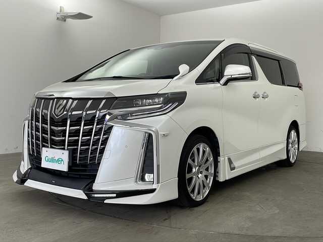 トヨタ アルファード S 兵庫県 2018(平30)年 7万km ホワイトパールクリスタルシャイン ・純正10インチナビ/Bluetooth/CD/DVD/USB/HDMI/TV/・バックカメラ/・サイドカメラ/・純正フリップダウンモニター/・トヨタセーフティセンス/・プリクラッシュセーフティ/・レーントレーシングアシスト/・クリアランスソナー/・パーキングサポートブレーキ/・ロードサインアシスト/・レーダクルーズコントロール/・オートマチックハイビーム/・横滑り防止装置/・電子パーキングブレーキ/・オートホールド/・両側パワースライドドア/・革巻きステアリング/・ステアリングスイッチ/・デジタルインナーミラー/・純正フロアマット/・全席合皮シートカバー/・オールオートパワーウィンドウ/・電動格納ミラー/・TRDエアロパーツ/・社外19インチアルミホイールタイヤ/・LEDヘッドライト/・フォグランプ/・MTモード付AT/・nanoe/・AC100V充電/・純正ドライブレコーダー/・ビルトインETC/・スマートキー