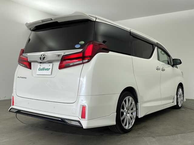 トヨタ アルファード S 兵庫県 2018(平30)年 7万km ホワイトパールクリスタルシャイン ・純正10インチナビ/Bluetooth/CD/DVD/USB/HDMI/TV/・バックカメラ/・サイドカメラ/・純正フリップダウンモニター/・トヨタセーフティセンス/・プリクラッシュセーフティ/・レーントレーシングアシスト/・クリアランスソナー/・パーキングサポートブレーキ/・ロードサインアシスト/・レーダクルーズコントロール/・オートマチックハイビーム/・横滑り防止装置/・電子パーキングブレーキ/・オートホールド/・両側パワースライドドア/・革巻きステアリング/・ステアリングスイッチ/・デジタルインナーミラー/・純正フロアマット/・全席合皮シートカバー/・オールオートパワーウィンドウ/・電動格納ミラー/・TRDエアロパーツ/・社外19インチアルミホイールタイヤ/・LEDヘッドライト/・フォグランプ/・MTモード付AT/・nanoe/・AC100V充電/・純正ドライブレコーダー/・ビルトインETC/・スマートキー