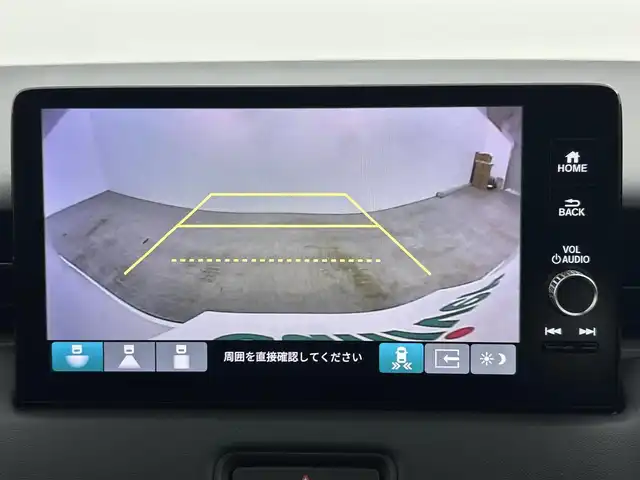 ホンダ ヴェゼル ハイブリッド e:HEV Z 岡山県 2025(令7)年 0.1万km未満 プラチナホワイトパール 登録済未使用車/Honda CONNECT９インチディスプレイオーディオ/（Bluetooth、フルセグTV、Carplay)/USB接続/レーダークルーズコントロール/LEDヘッドライト/ビルトインETC2.0/置くだけ充電/フロントグリル:ベルリナブラック/シートヒーター/ステアリングヒーター/ハーフレザー/ブラインドスポットモニター/パドルシフト/アイドリングストップ/チルトステアリング/シートリフター/ステアリングスイッチ/ISOFIX/純正リアスポイラー/バックカメラ/コーナーセンサー/踏み間違い防止/横滑り防止装置/スマートキー×2/新車保証書/取扱説明書