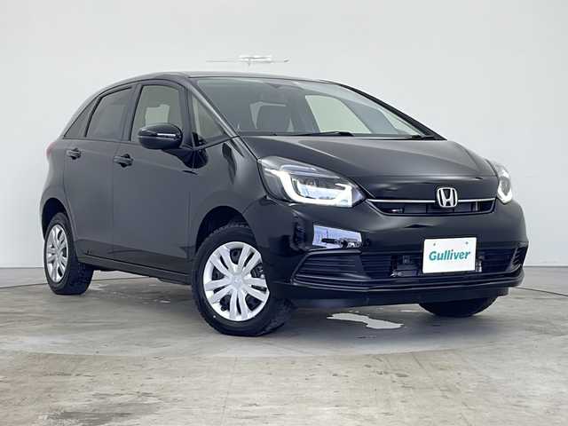 ホンダ フィット ホーム 道央・札幌 2023(令5)年 0.8万km クリスタルブラックパール ４ＷＤ/ホンダセンシング/純正オーディオ/　(CD/DVD/FM/AUX)/前後コーナーセンサー/ビルトインＥＴＣ/ＬＥＤライト/オートライト/オートハイビーム/純正フロアマット　/ハーフレザーシート/プッシュスタート/スマートキー/ステアリングリモコン/電動格納ミラー/取扱説明書/保証書