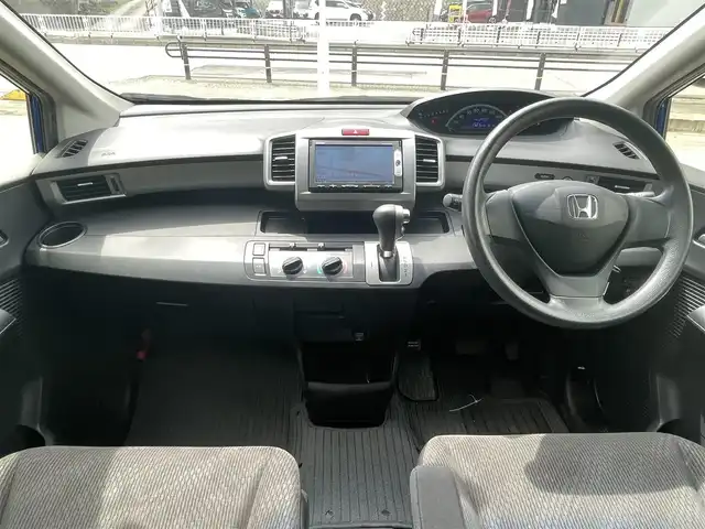 ホンダ フリード G 岐阜県 2015(平27)年 4.9万km コバルトブルーパール /社外SDナビ/（ワンセグテレビ.AM.FM.CD.DVD.SD.Bluetooth）//バックカメラ//ドアバイザー//両側スライドドア//電格ミラー//4WD//ETC