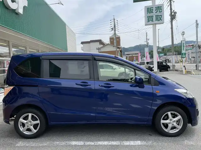 ホンダ フリード G 岐阜県 2015(平27)年 4.9万km コバルトブルーパール /社外SDナビ/（ワンセグテレビ.AM.FM.CD.DVD.SD.Bluetooth）//バックカメラ//ドアバイザー//両側スライドドア//電格ミラー//4WD//ETC