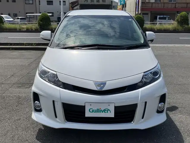 トヨタ エスティマ アエラス レザーパッケージ 三重県 2014(平26)年 4.9万km ホワイトパールクリスタルシャイン ♪走行48477km/純正8インチナビ/・フルセグ・CD録音/・DVD再生・SD/・Bluetoothオーティオ/ブルーレイディスクプレーヤー内蔵/　純正フリップダウンモニター/　・DVD/BD/SD/バックカメラ/両側パワースライドドア/スマートキー/プッシュスタート/黒革シート/パワーシート/前席シートヒーター/クルーズコントロール/HIDヘッドライト/フォグライト /オートライト/ウィンカーミラー /セカンドシートオットマン/革巻ステアリング/ステアリングスイッチ/ビルトインETC/ウッドパネル/ドライブレコーダー/レーダー探知機/プライバシーガラス/ドアバイザー/電格ミラー/フロアマット