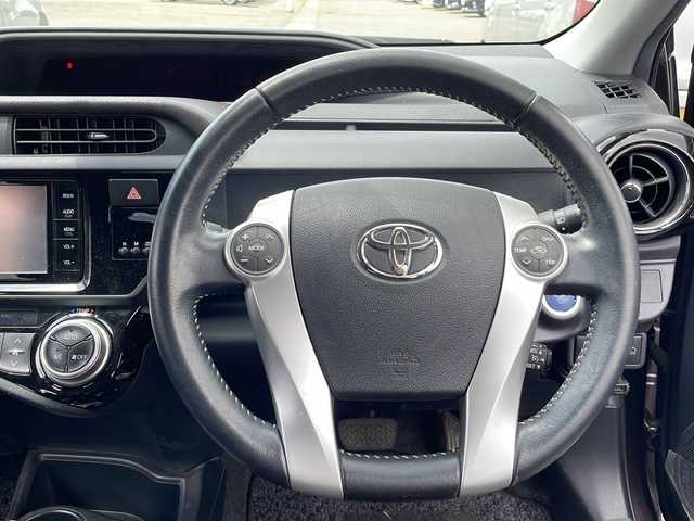 トヨタ アクア G 岩手県 2015(平27)年 8.6万km ディープアメジストマイカメタリック 禁煙車/純正SDナビ/AM/FM/CD/Bluetooth/フルセグTV/純正オーディオ/バックカメラ/ETC/クルーズコントロール/衝突被害軽減ブレーキ/レーンキープアシスト/横滑り防止装置/シートヒーター/オートライト/オートハイビーム/LEDヘッドライト/フォグランプ/スマートキー/プッシュスタート/電動格納ミラー/純正フロアマット/保証書/取扱説明書