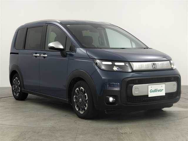 ホンダ フリード クロスター 愛知県 2025(令7)年 0.2万km 紺 純正9インチディスプレイオーディオ/バックカメラ/Bluetooth/ホンダセンシング/衝突被害軽減システム/クルーズコントロール/コーナーセンサー/横滑り防止装置/ブラインドスポットモニター/オートライト/オートマチックハイビーム/LEDヘッドライト/LEDフォグランプ/両側パワースライドドア/純正AW/社外フロアマット/プッシュスタート/スマートキー/スペアキー
