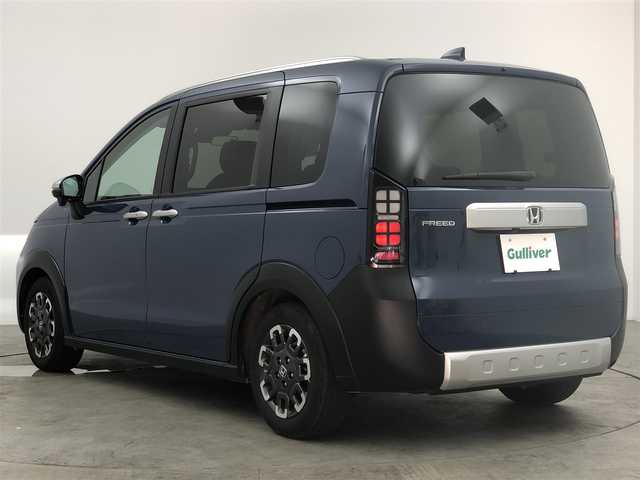 ホンダ フリード クロスター 愛知県 2025(令7)年 0.2万km 紺 純正9インチディスプレイオーディオ/バックカメラ/Bluetooth/ホンダセンシング/衝突被害軽減システム/クルーズコントロール/コーナーセンサー/横滑り防止装置/ブラインドスポットモニター/オートライト/オートマチックハイビーム/LEDヘッドライト/LEDフォグランプ/両側パワースライドドア/純正AW/社外フロアマット/プッシュスタート/スマートキー/スペアキー