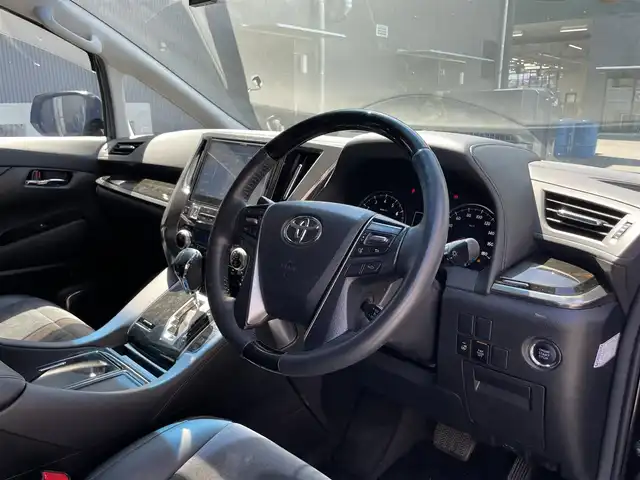トヨタ アルファード S Cパッケージ 滋賀県 2015(平27)年 5.6万km ブラック ALPINE製10インチナビ/【Bluetooth/CD/DVD/SD/フルセグTV】/ALPINE製フリップダウンモニター/バックカメラ/両側電動スライドドア/ハーフレザーシート /D/N席パワーシート/二列目パワーリクライニング/N席/二列目パワーオットマン/レーダークルーズコントロール/LEDヘッドライト/オートライト/オートマチックハイビーム/前後コーナーセンサー/ビルトインETC/パワーバックドア/プッシュスタート/スマートキー/ステアリングリモコン/後席サンシェード