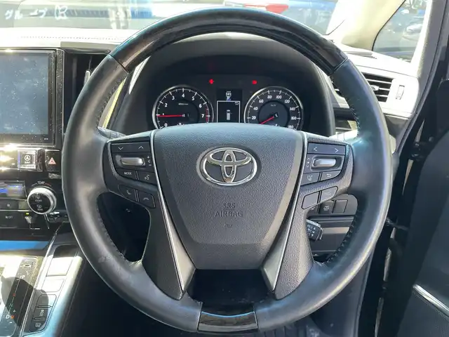 トヨタ アルファード S Cパッケージ 滋賀県 2015(平27)年 5.6万km ブラック ALPINE製10インチナビ/【Bluetooth/CD/DVD/SD/フルセグTV】/ALPINE製フリップダウンモニター/バックカメラ/両側電動スライドドア/ハーフレザーシート /D/N席パワーシート/二列目パワーリクライニング/N席/二列目パワーオットマン/レーダークルーズコントロール/LEDヘッドライト/オートライト/オートマチックハイビーム/前後コーナーセンサー/ビルトインETC/パワーバックドア/プッシュスタート/スマートキー/ステアリングリモコン/後席サンシェード
