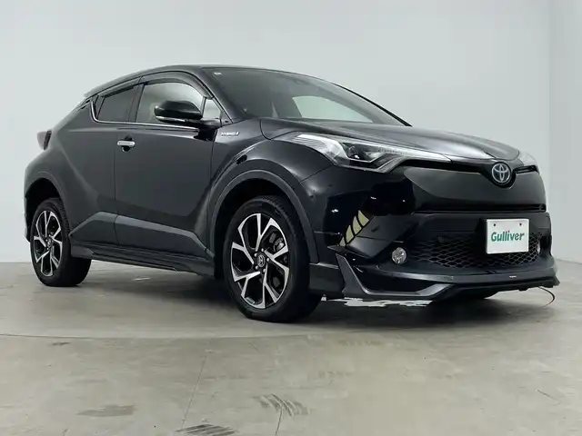 トヨタ Ｃ－ＨＲ G LEDエディション 鹿児島県 2018(平30)年 6.7万km ブラックマイカ 純正SDナビ/（AM/FM/CD/DVD/Bluetooth）/フルセグテレビ/モデリスタエアロ/トヨタセーフティセンス/レーダークルーズコントロール/シートヒーター/ETC/ハーフレザーシート/オートライト/オートハイビーム/ドライブレコーダー/純正AW18インチ/オートブレーキホールド/LEDヘッドライト/純正フロアマット/オートエアコン