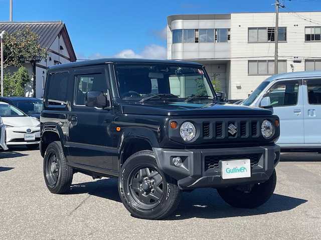 スズキ ジムニー XL 福井県 2018(平30)年 3.3万km ブルーイッシュブラックパール3 登録時走行距離３２５６０ｋｍ/４WD/ターボ/背面タイヤ/プリクラッシュセーフティ/レーンキープアシスト/純正メモリナビゲーション/（CD/DVD/BT）/フルセグ/バックカメラ/ETC(ビルトイン)/シートヒーター/ライトレベライザー/ドアバイザー/電動格納ミラー/スマートキー/プッシュスタート/保証書/取扱説明書
