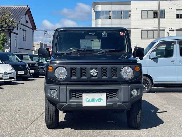 スズキ ジムニー XL 福井県 2018(平30)年 3.3万km ブルーイッシュブラックパール3 登録時走行距離３２５６０ｋｍ/４WD/ターボ/背面タイヤ/プリクラッシュセーフティ/レーンキープアシスト/純正メモリナビゲーション/（CD/DVD/BT）/フルセグ/バックカメラ/ETC(ビルトイン)/シートヒーター/ライトレベライザー/ドアバイザー/電動格納ミラー/スマートキー/プッシュスタート/保証書/取扱説明書