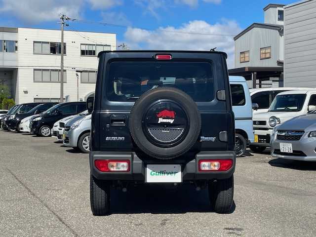 スズキ ジムニー XL 福井県 2018(平30)年 3.3万km ブルーイッシュブラックパール3 登録時走行距離３２５６０ｋｍ/４WD/ターボ/背面タイヤ/プリクラッシュセーフティ/レーンキープアシスト/純正メモリナビゲーション/（CD/DVD/BT）/フルセグ/バックカメラ/ETC(ビルトイン)/シートヒーター/ライトレベライザー/ドアバイザー/電動格納ミラー/スマートキー/プッシュスタート/保証書/取扱説明書