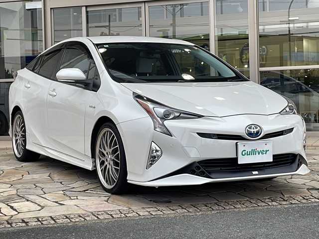 トヨタ プリウス A 静岡県 2016(平28)年 9.7万km ホワイトパールクリスタルシャイン 純正SDナビ/・CD/・DVD/・フルセグＴＶ/・Bluetooth/・AM/・FM/主要装備/・TRDエアロF/R/・衝突軽減/・レーンキープ/・追従クルコン/・BSM/・コーナーセンサー前後/・バックカメラ/・ETC/・ドラレコ前/・HUD/・ステリモ/・ヒーテッドドアミラー/・スマートキー/・プッシュスタート/・純正フロアマット/・社外アルミホイール/・LEDヘッドライト/・オートライト/・オートハイビーム