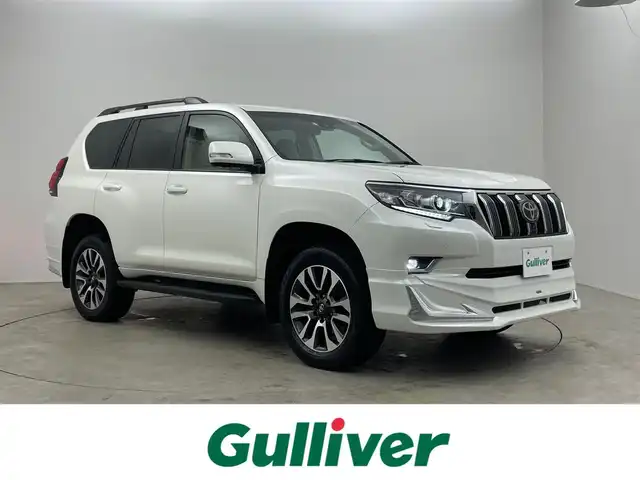 トヨタ ランドクルーザー プラド TX Lパッケージ 埼玉県 2023(令5)年 3.3万km ホワイトパールクリスタルシャイン モデリスタエアロ　サンルーフ　純正ディスプレイオーディオ　パノラミックビューモニター　ＢＳＭ　ベージュレザー　ビルトインＥＴＣ２．０　ドライブレコーダー　レーダークルーズ　オートハイビーム　ＬＥＤ