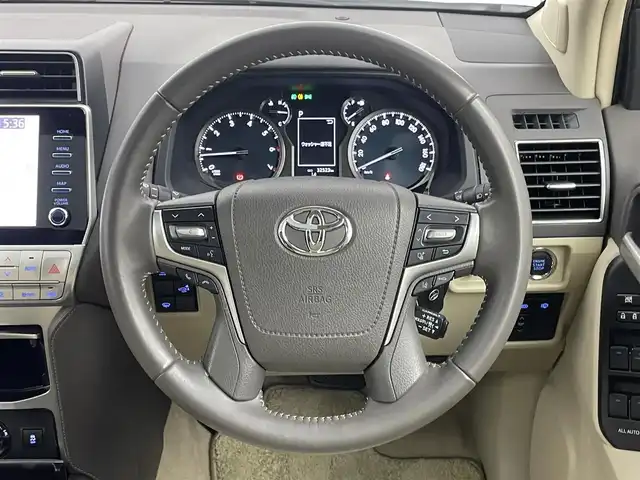 トヨタ ランドクルーザー プラド TX Lパッケージ 埼玉県 2023(令5)年 3.3万km ホワイトパールクリスタルシャイン モデリスタエアロ　サンルーフ　純正ディスプレイオーディオ　パノラミックビューモニター　ＢＳＭ　ベージュレザー　ビルトインＥＴＣ２．０　ドライブレコーダー　レーダークルーズ　オートハイビーム　ＬＥＤ