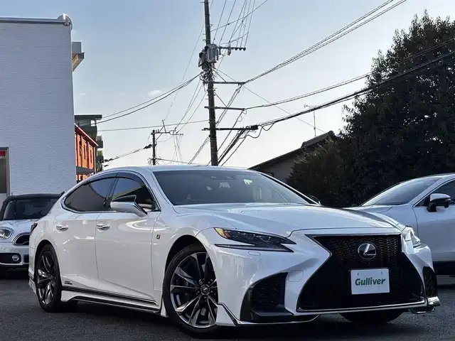レクサス ＬＳ 500h Fスポーツ 熊本県 2020(令2)年 7.5万km ホワイトノーヴァガラスフレーク モデリスタエアロ（F.S.R）/純正メーカーナビ/【フルセグTV/Bluetooth/AM/FM】/パノラミックビューモニター/レクサスセーフティーセンス＋A/・レーダークルーズコントロール/・プリクラッシュセーフティー/・フロントクロストラフィックアラート/・レーントレーシングアシスト/・ロードサインアシスト/・アダプティブハイビームシステム/・先行車発進告知機能/クリアランスソナー/ブラインドスポットモニター/ヘッドアップディスプレイ/デジタルインナーミラー/パドルシフト/オートLEDライト/オートハイビーム/ブレーキホールド/レザーシート/前席シートヒーター/エアシート/前席パワーシート/革巻きステアリング/ステアリングスイッチ/ステアリングヒーター/ETC2.0/ドライブレコーダー前後/電動リアゲート/純正フロアマット/純正ドアバイザー/横滑り防止装置/取扱説明書/スペアキー