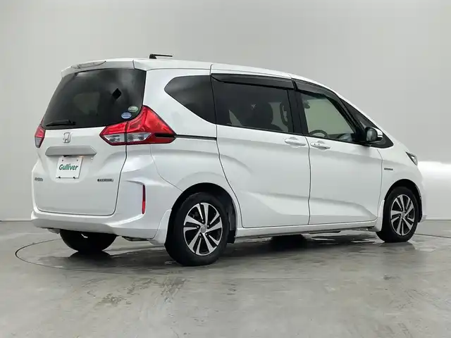 ホンダ フリード ハイブリット EX 埼玉県 2017(平29)年 7.2万km ホワイトオーキッドパール 純正９インチナビ　両側電動スライドドア　衝突軽減ブレーキ　アダプティブクルーズコントロール　ビルトインＥＴＣ　ＬＥＤヘッドライト　シートヒーター　バックカメラ　ドライブレコーダー　合皮ハーフレザーシート