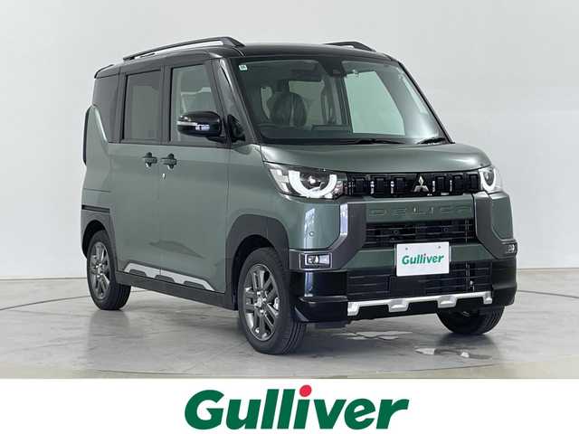 三菱 デリカミニ T プレミアム 道央・札幌 2024(令6)年 0.1千km 緑Ⅱ ・4WD/・純正9インチディスプレイオーディオ/(BT・Android Auto Apple・Carplay・AM・FM・USB)/・全方位カメラ/バックカメラ/・両側パワースライドドア/・衝突軽減システム/・LDP（車線逸脱防止支援システム）/・レーダークルーズコントロール/・コーナーセンサー/・ハンズフリーオートスライドドア/・前席シートヒーター/・ステアリングヒーター/・ステアリングスイッチ/・リアサーキュレーター/・LEDヘッドライト/・フォグライト/・オートライト/・MTモード付AT（パドルシフト付）/・電格ウィンカーミラー/・スマートキー/・プッシュスタート