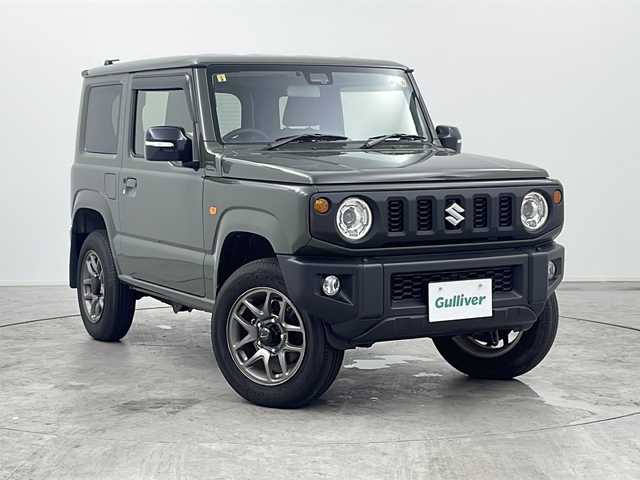 スズキ ジムニー XC 三重県 2023(令5)年 2万km ジャングルグリーン 禁煙車/ｓｔｒａｄｅ７インチＳＤナビ/・Ｂｌｕｅｔｏｏｔｈ・ＣＤ／ＤＶＤ・フルセグ・SD/スズキセーフティサポート/・衝突軽減ブレーキ・車線逸脱抑制制御機能/・ハイビームアシスト/前席シートヒーター/クルーズコントロール/革巻きステアリング/電動格納ミラー/ヒーテッドドアミラー