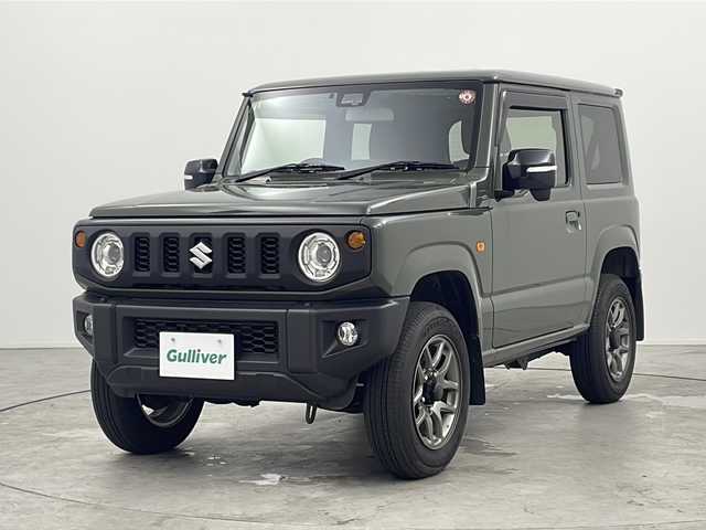 スズキ ジムニー XC 三重県 2023(令5)年 2万km ジャングルグリーン 禁煙車/ｓｔｒａｄｅ７インチＳＤナビ/・Ｂｌｕｅｔｏｏｔｈ・ＣＤ／ＤＶＤ・フルセグ・SD/スズキセーフティサポート/・衝突軽減ブレーキ・車線逸脱抑制制御機能/・ハイビームアシスト/前席シートヒーター/クルーズコントロール/革巻きステアリング/電動格納ミラー/ヒーテッドドアミラー