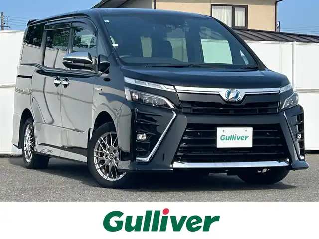 トヨタ ヴォクシー ハイブリッド ZS 煌Ⅱ 岩手県 2019(令1)年 5.2万km ブラック トヨタセーフティセンス/　・プリクラッシュセーフティ/　・レーンディパーチャーアラート/　・オートマチックハイビーム/純正メモリナビ/　　Bt/USB/フルセグTV/バックカメラ/クルーズコントロール/両側パワースライドドア/LEDオートライト/フォグランプ/純正16インチアルミホイール/クリアランスソナー/アイドリングストップ/スマートキー/ビルトインETC