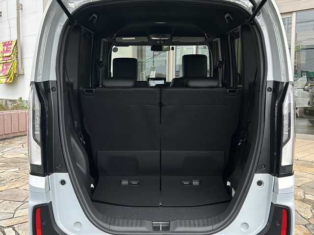 ホンダ Ｎ ＢＯＸ カスタム ターボ 静岡県 2024(令6)年 0.9万km プレミアムサンライトホワイトパール 純正ナビ/・フルセグTV/・Bluetooth/・iPod/・USB/・FM/AM/主要装備/・ＥＴＣ/・追従クルコン/・両側パワスラ/・横滑り防止装置/・ホンダセンシング/・運転席＋助手席シートヒーター/・パドルシフト/・純正切削１５インチアルミホイール/・オートライト/・電動パーキング/・オートホールド　/・ハーフレザー/・本革巻ステアリングホイール