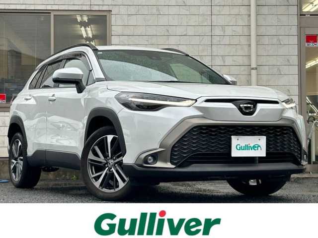 トヨタ カローラ クロス Z 福岡県 2023(令5)年 2.1万km プラチナホワイトパールマイカ ワンオーナー/純正9インチディスプレイオーディオ/　（AM/FM/Bluetooth/フルセグTV）/バックカメラ/トヨタセーフティーセンス/・プリクラッシュセーフティ/・レーントレーシングアシスト/・オートマチックハイビーム/・ロードサインアシスト/・レーダークルーズコントロール/・先行車発進告知機能/オートライト/コナーセンサー/クリアランスソナー/ブラインドスポットモニター/横滑り防止機能/純正18インチアルミホイール/パワーバックドア/ルーフレール/黒色ハーフレザーシート/パワーシート（D席）/シートヒーター（D/N）/ビルトインETC/純正フロアマット/社外ドリンクホルダー/電格ウインカーミラー/USB端子×3/電源ソケット×1/プッシュスタート/ドアバイザー/ISOFIX/盗難防止装置/スペアキー×1/保証書/取扱説明書/ナビ取扱説明書