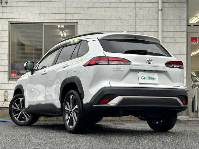 トヨタ カローラ クロス Z 福岡県 2023(令5)年 2.1万km プラチナホワイトパールマイカ ワンオーナー/純正9インチディスプレイオーディオ/　（AM/FM/Bluetooth/フルセグTV）/バックカメラ/トヨタセーフティーセンス/・プリクラッシュセーフティ/・レーントレーシングアシスト/・オートマチックハイビーム/・ロードサインアシスト/・レーダークルーズコントロール/・先行車発進告知機能/オートライト/コナーセンサー/クリアランスソナー/ブラインドスポットモニター/横滑り防止機能/純正18インチアルミホイール/パワーバックドア/ルーフレール/黒色ハーフレザーシート/パワーシート（D席）/シートヒーター（D/N）/ビルトインETC/純正フロアマット/社外ドリンクホルダー/電格ウインカーミラー/USB端子×3/電源ソケット×1/プッシュスタート/ドアバイザー/ISOFIX/盗難防止装置/スペアキー×1/保証書/取扱説明書/ナビ取扱説明書