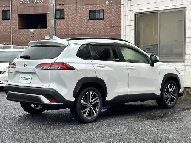 トヨタ カローラ クロス Z 福岡県 2023(令5)年 2.1万km プラチナホワイトパールマイカ ワンオーナー/純正9インチディスプレイオーディオ/　（AM/FM/Bluetooth/フルセグTV）/バックカメラ/トヨタセーフティーセンス/・プリクラッシュセーフティ/・レーントレーシングアシスト/・オートマチックハイビーム/・ロードサインアシスト/・レーダークルーズコントロール/・先行車発進告知機能/オートライト/コナーセンサー/クリアランスソナー/ブラインドスポットモニター/横滑り防止機能/純正18インチアルミホイール/パワーバックドア/ルーフレール/黒色ハーフレザーシート/パワーシート（D席）/シートヒーター（D/N）/ビルトインETC/純正フロアマット/社外ドリンクホルダー/電格ウインカーミラー/USB端子×3/電源ソケット×1/プッシュスタート/ドアバイザー/ISOFIX/盗難防止装置/スペアキー×1/保証書/取扱説明書/ナビ取扱説明書