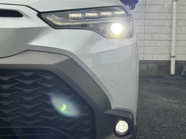 トヨタ カローラ クロス Z 福岡県 2023(令5)年 2.1万km プラチナホワイトパールマイカ ワンオーナー/純正9インチディスプレイオーディオ/　（AM/FM/Bluetooth/フルセグTV）/バックカメラ/トヨタセーフティーセンス/・プリクラッシュセーフティ/・レーントレーシングアシスト/・オートマチックハイビーム/・ロードサインアシスト/・レーダークルーズコントロール/・先行車発進告知機能/オートライト/コナーセンサー/クリアランスソナー/ブラインドスポットモニター/横滑り防止機能/純正18インチアルミホイール/パワーバックドア/ルーフレール/黒色ハーフレザーシート/パワーシート（D席）/シートヒーター（D/N）/ビルトインETC/純正フロアマット/社外ドリンクホルダー/電格ウインカーミラー/USB端子×3/電源ソケット×1/プッシュスタート/ドアバイザー/ISOFIX/盗難防止装置/スペアキー×1/保証書/取扱説明書/ナビ取扱説明書