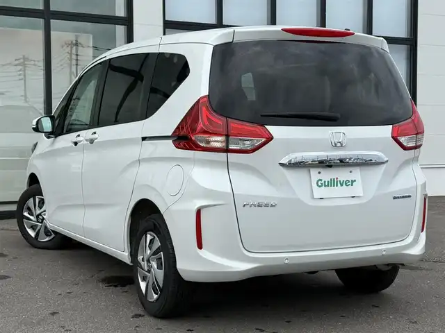 ホンダ フリード ハイブリット G 道南・函館 2024(令6)年 0.9万km プラチナホワイトパール 純正メモリナビ/・フルセグＴＶ/・寒冷地仕様/・衝突被害軽減ブレーキ/・バックカメラ/・レーダークルーズコントロール/・車線逸脱警報/・両側パワースライドドア/・前後ドライブレコーダー/・前席シートヒーター/・LEDアダプティブコーナリングライト/・ウォークスルー/・ETC/・新車時保証書・取扱説明書