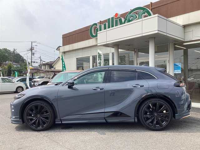 トヨタ クラウン スポーツ Z 兵庫県 2024(令6)年 0.8万km グレー ワンオーナー/モデリスタエアロ/純正12.3インチディスプレイオーディオ/（フルセグ/USB/Bluetooth）/Tコネクト/Miracast/ETC/デジタルインナーミラー/全方位モニター/ヘッドアップディスプレイ/トヨタチームメイト/・レーダークルコン/・LDA/・BSM/・PCS/・PDA/・RCTA/・RCD/・PKSB/・SEA/・AVSP/・RSA/・後方車両接近告知/置くだけ充電/パワーバックドア/レザーシート/シートヒーター・エアーシート（D/N席）/LEDヘッドライト/LEDフォグ/オートライト/オートライトハイビーム/ヘッドライトウォッシャー//スマートキー/スペアキー/取扱説明書/保証書/カラーコード　1M2   アッシュ